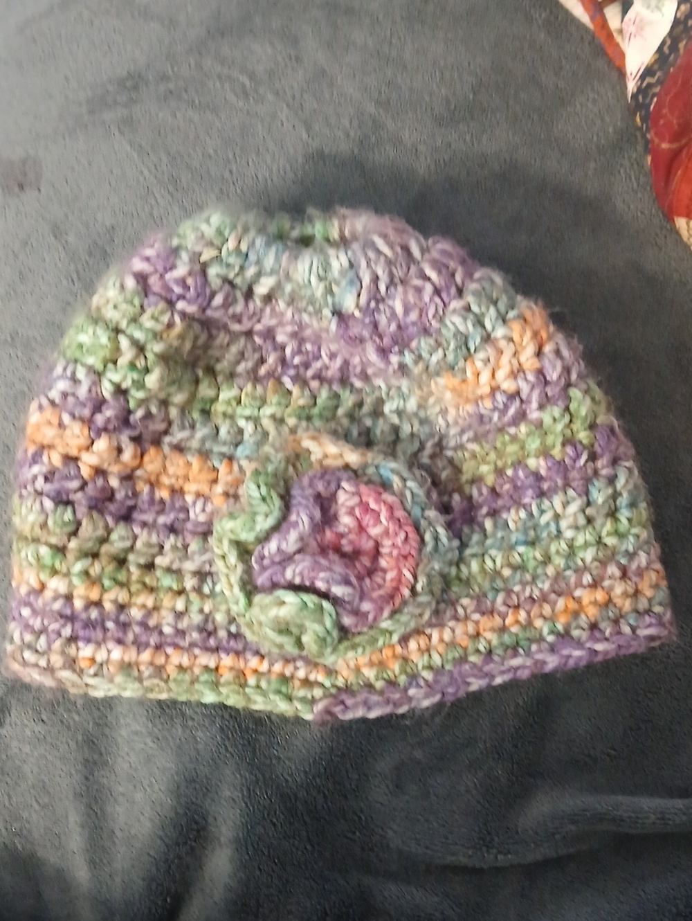 Handmade Multicolor Crochet Beanie with Flower Accent